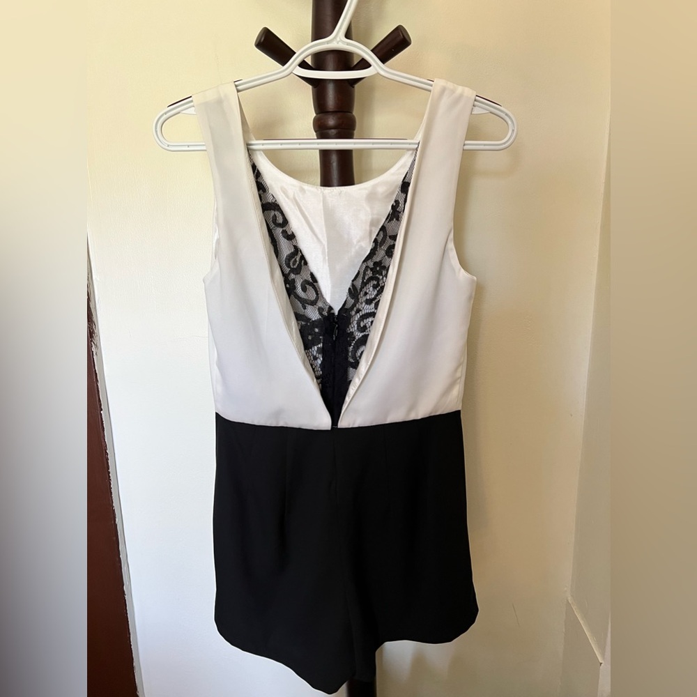Elegant black and white lace romper